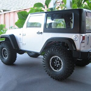 Proline 2009 Jeep Wrangler Rubicon Body on my SCX10

I really like the body but, this is as high as the body can go in the rear. Its maxxed out and I'