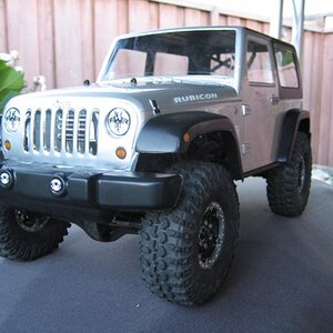 Proline 2009 Jeep Wrangler Rubicon Body on my SCX10

I really like the body but, this is as high as the body can go in the rear. Its maxxed out and I'