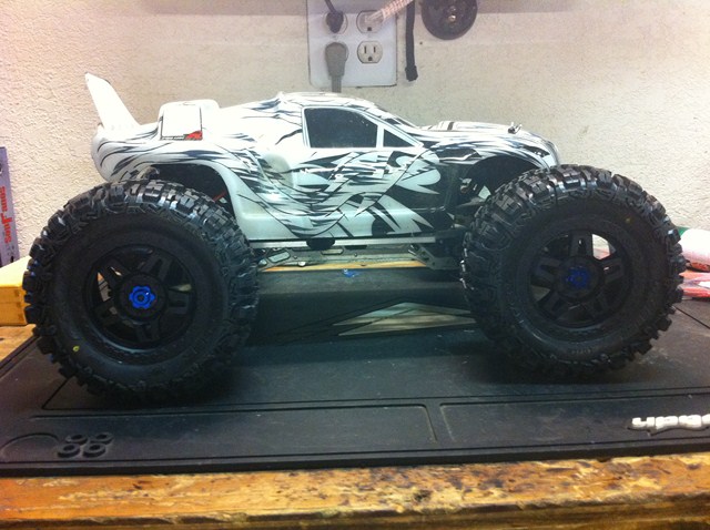 I dragged the E-Maxx out of the closet as its been sitting around for the past 3 or 4 years. Time for some upgrades, RX8 and New Shoes.